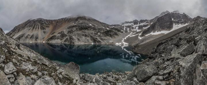 Turquoise lake in a rocky cirque